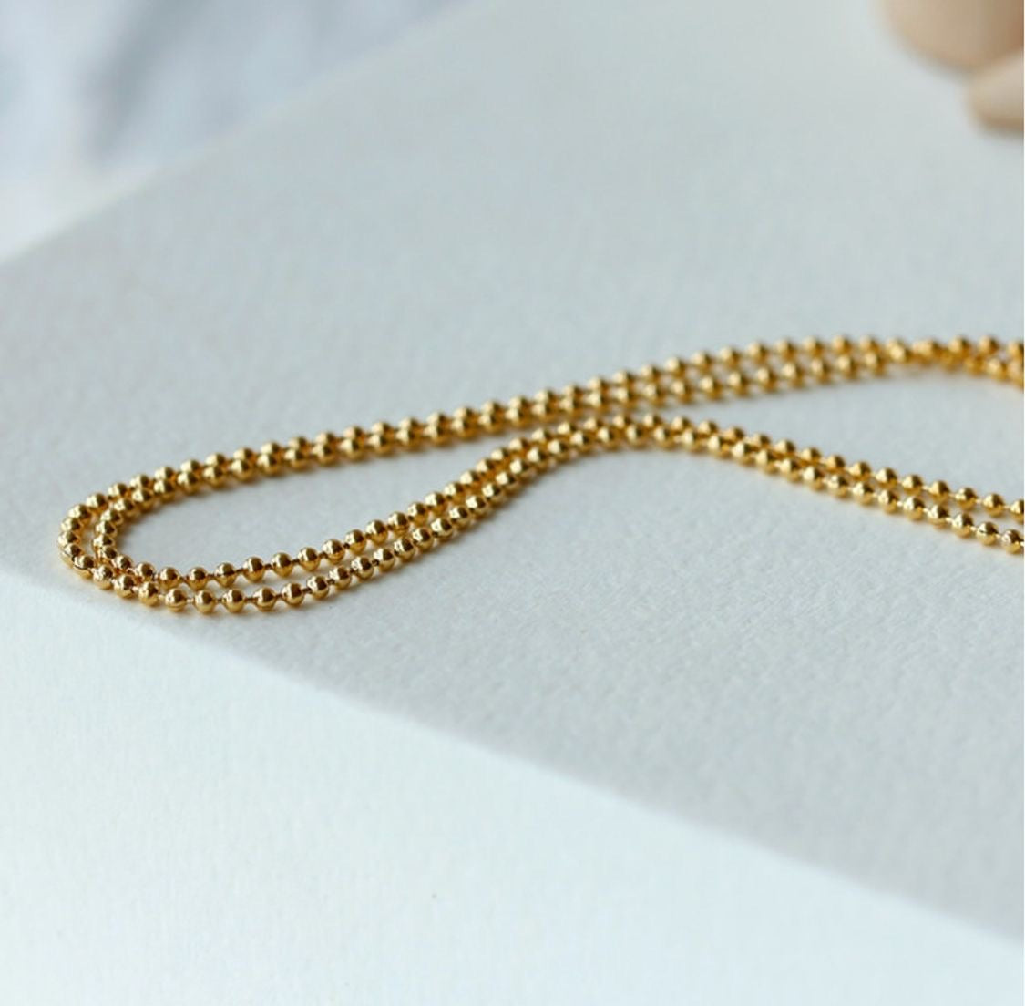 Delicate necklace "DotDotDot" with 18K gold plating