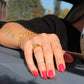 Goldener Ring "F*** off" in Herzform